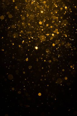 Siyah arkaplan ile soyut altın bokeh