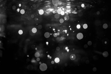 Siyah arka plan üzerinde ışık bokeh bulanıklık