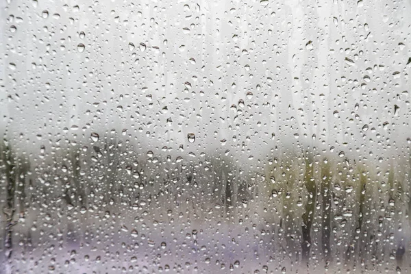 ガラス窓の背景に水滴 — ストック写真