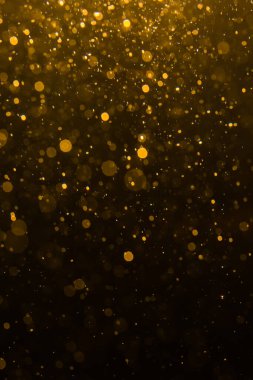 Siyah arkaplan ile soyut altın bokeh