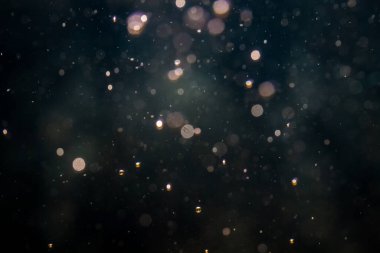 Siyah arka plan üzerinde ışık bokeh bulanıklık