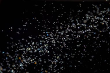 siyah arka plan üzerinde renkli bokeh