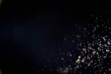 siyah arka plan üzerinde renkli bokeh