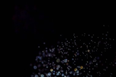 siyah arka plan üzerinde renkli bokeh