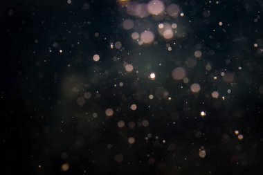 Siyah arka plan üzerinde ışık bokeh bulanıklık