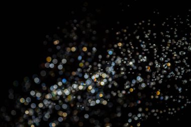 siyah arka plan üzerinde renkli bokeh