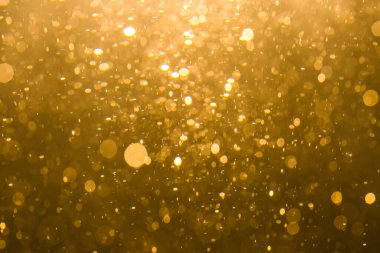 Siyah arkaplan ile soyut altın bokeh