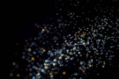 siyah arka plan üzerinde renkli bokeh