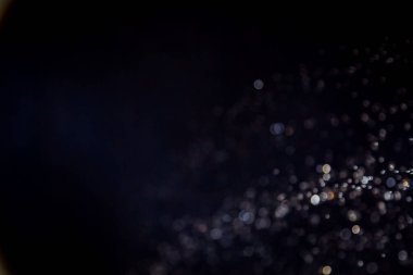 siyah arka plan üzerinde renkli bokeh