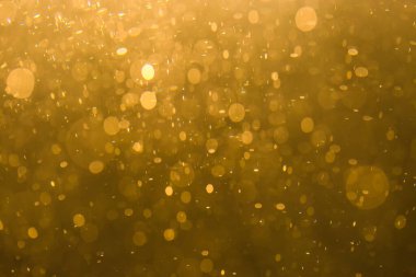 Siyah arkaplan ile soyut altın bokeh