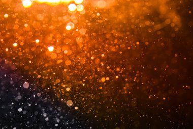 Siyah arkaplan ile soyut altın bokeh