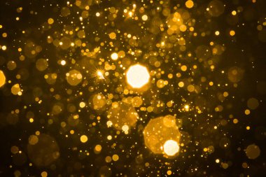 Soyut bulanık altın parıltılı bokeh arkaplan