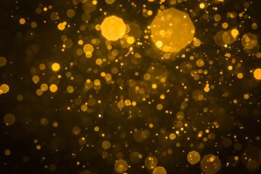 Soyut bulanık altın parıltılı bokeh arkaplan