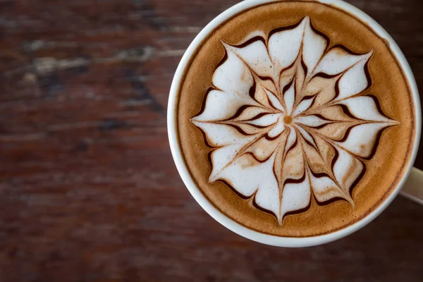 Xícara Café Com Arte Latte Topo Com Fundo Mesa Madeira — Fotografia de Stock