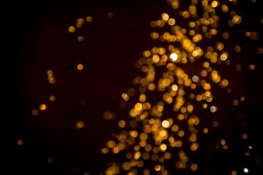 Defocus bokeh simli altın antika ışıklar koyu arkaplan