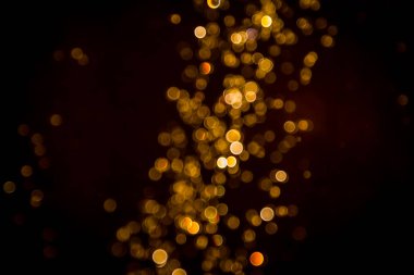 Defocus bokeh simli altın antika ışıklar koyu arkaplan