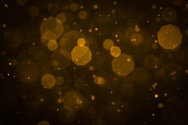 Soyut bulanık altın parıltılı bokeh arkaplan