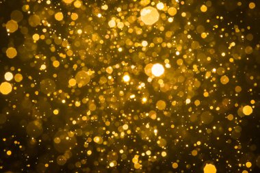 Soyut bulanık altın parıltılı bokeh arkaplan