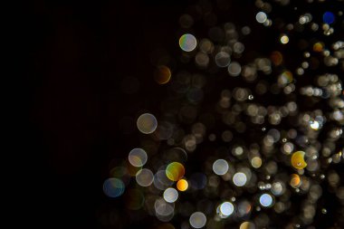 Siyah arkaplanda ışık bokeh