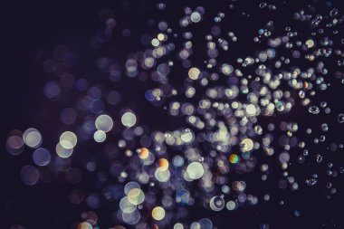 Defocus bokeh simli altın antika ışıklar koyu arkaplan