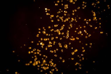 Defocus bokeh simli altın antika ışıklar koyu arkaplan