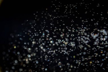 siyah arka plan üzerinde renkli bokeh