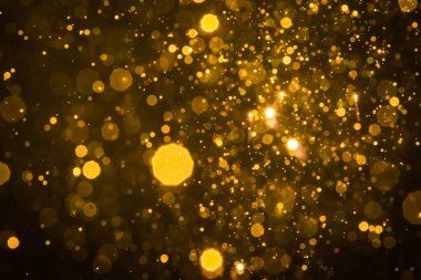 Soyut bulanık altın parıltılı bokeh arkaplan