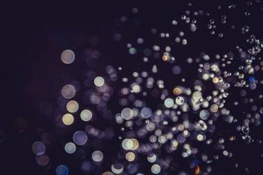 Defocus bokeh simli altın antika ışıklar koyu arkaplan