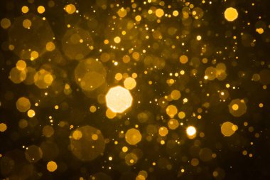 Soyut bulanık altın parıltılı bokeh arkaplan