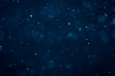 Noel arkaplanı için soyut mavi ışık bulanık bokeh halkaları