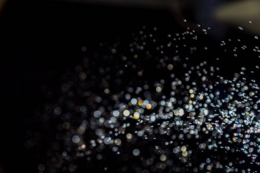 siyah arka plan üzerinde renkli bokeh