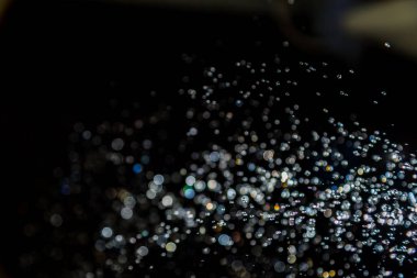 siyah arka plan üzerinde renkli bokeh