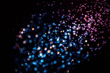 siyah arka plan üzerinde renkli bokeh