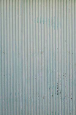 Arka plan için eski yeşil çinko çit metal duvar kullanımı.