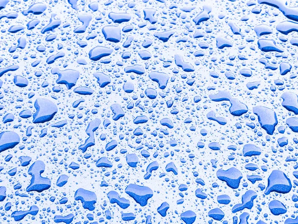 Gota Agua Sobre Fondo Azul —  Fotos de Stock