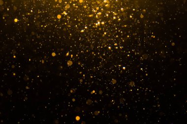 Siyah arkaplan ile soyut altın bokeh