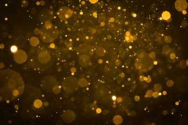 Soyut bulanık altın parıltılı bokeh arkaplan
