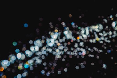 siyah arka plan üzerinde renkli bokeh