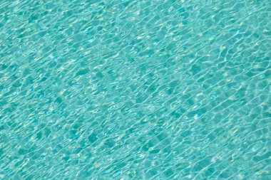 Mavi havuz arka planında ışık dalgası yansıması