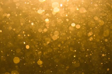 Siyah arkaplan ile soyut altın bokeh