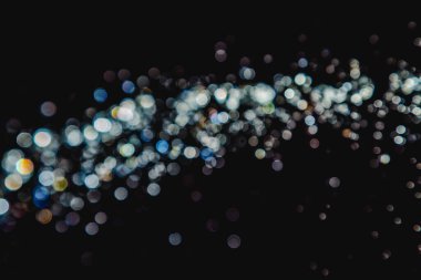 siyah arka plan üzerinde renkli bokeh