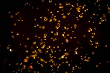 Defocus bokeh simli altın antika ışıklar koyu arkaplan