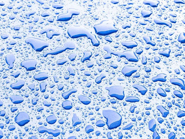 Wassertropfen Auf Blauem Hintergrund — Stockfoto