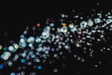 siyah arka plan üzerinde renkli bokeh