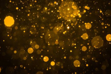 Soyut bulanık altın parıltılı bokeh arkaplan