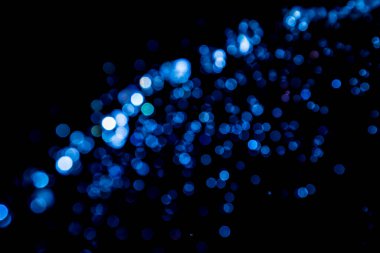 siyah arka plan üzerinde renkli bokeh