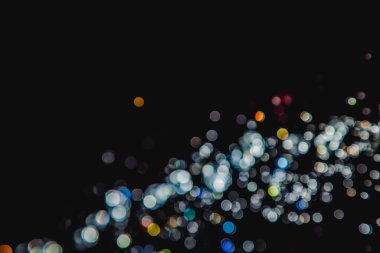 siyah arka plan üzerinde renkli bokeh