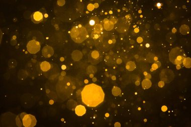 Soyut bulanık altın parıltılı bokeh arkaplan