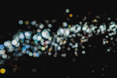 siyah arka plan üzerinde renkli bokeh