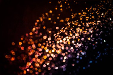 siyah arka plan üzerinde renkli bokeh